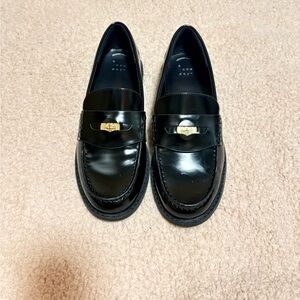 Black Loafers with Gold Accent